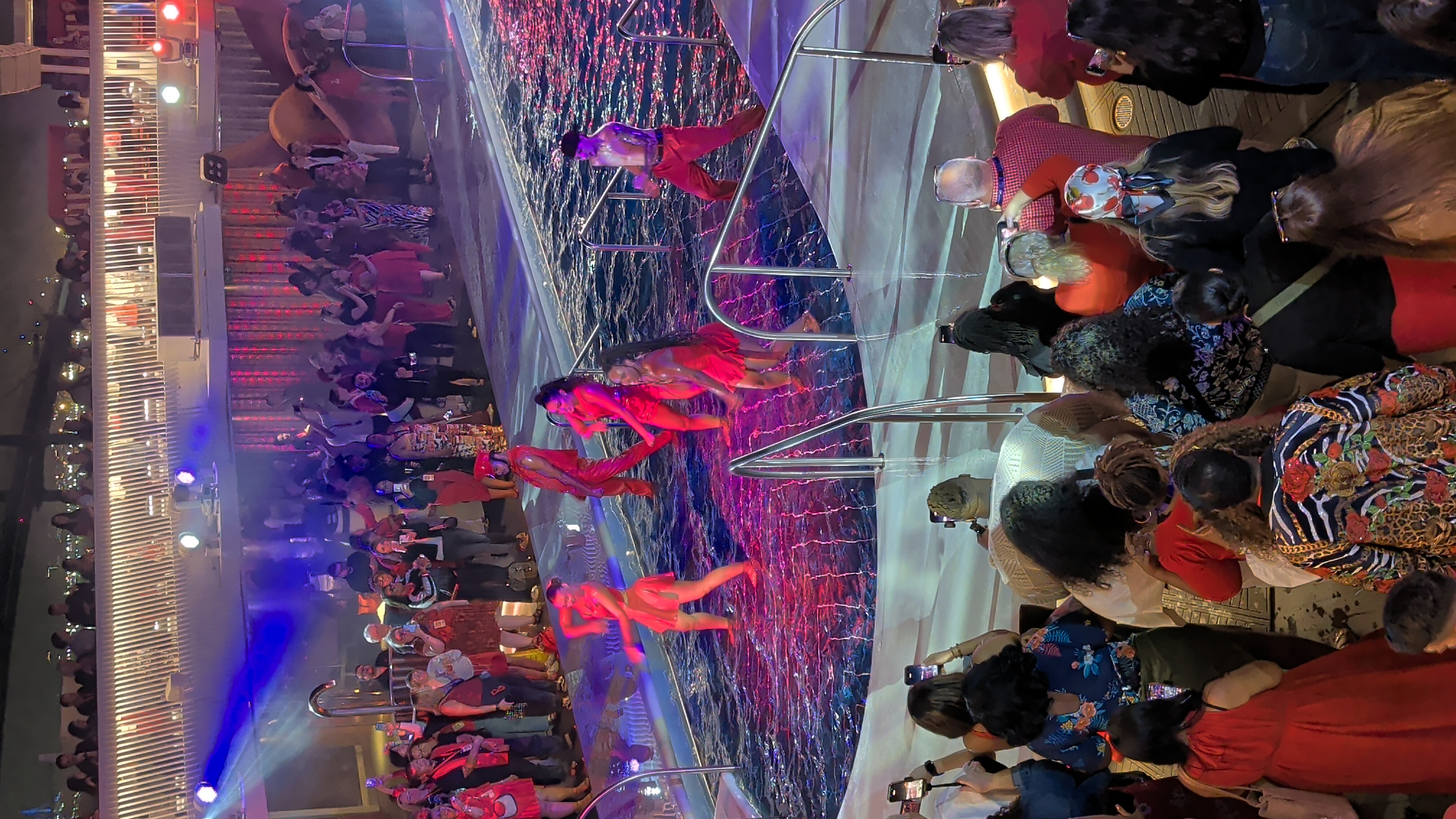 Guests celebrating Scarlet Night in red on Brilliant Lady